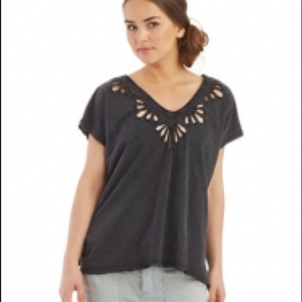 Wide tee with cut outs at the neckline